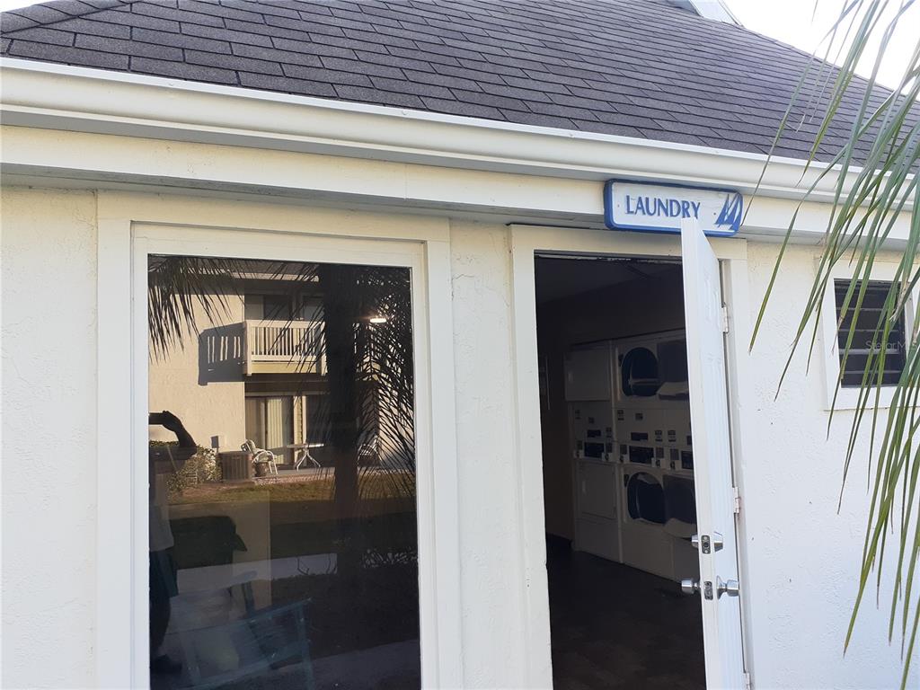 455 Alt 19, Unit 16 Palm Harbor, FL 34683 - Photo 24 of 25 a view of living room with a fireplace