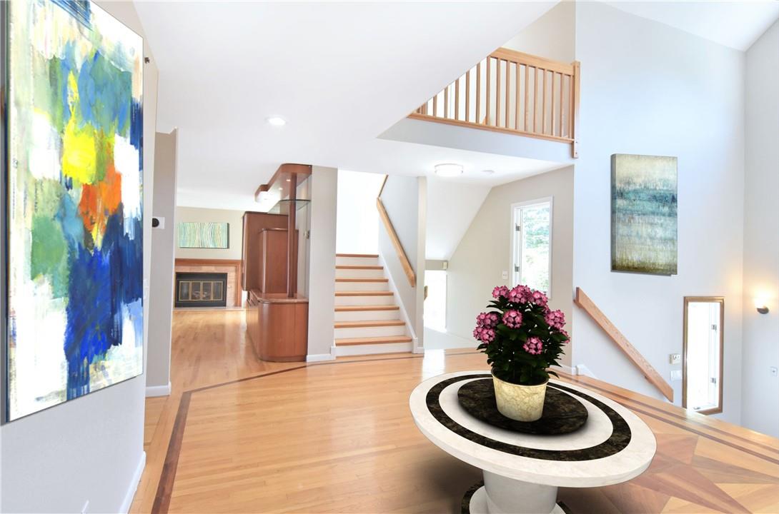 115 Bramblebrook Road Ardsley, NY 10502 - Photo 1 of 1 Elegant, light-filled entry beckons, providing open flow & great sightlines. (virtually staged)