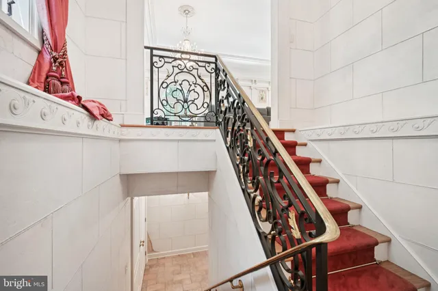 a view of balcony with wooden floor and fence