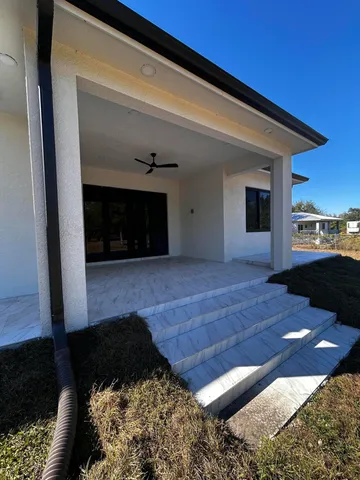 a view of house with yard