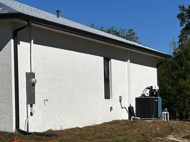 a house view with a garden space