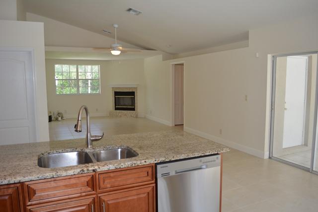 18710 93rd Road North Loxahatchee, FL 33470 - Photo 13 of 34 Kitchen into Fam Rm
