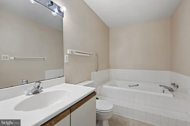 a bathroom with a sink and a bathtub
