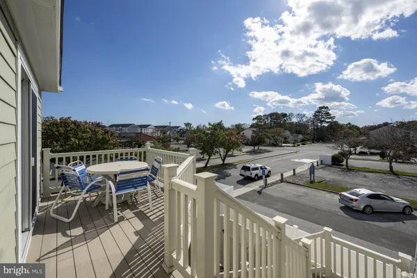 a view of a terrace with sitting area