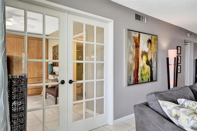 a view of a balcony with chairs