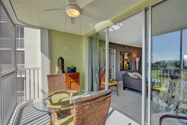 a view of a balcony with lake view and a ocean view