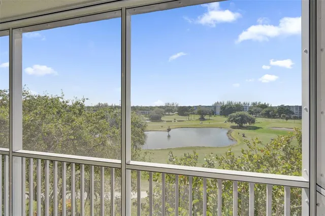 a view of a balcony with an ocean view