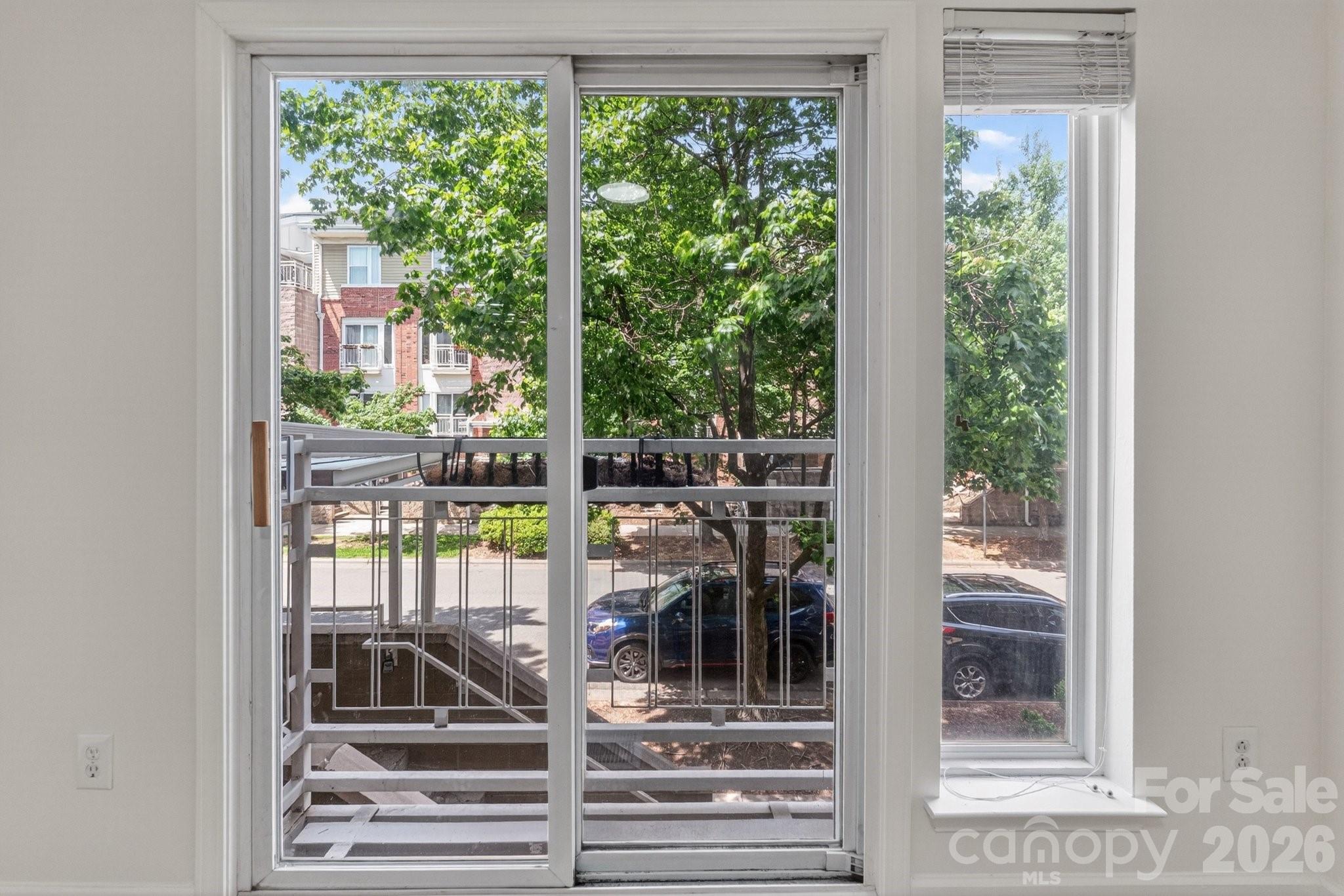 639 Raphael Place Charlotte, NC 28205 - Photo 14 of 36 a view of a living room and balcony