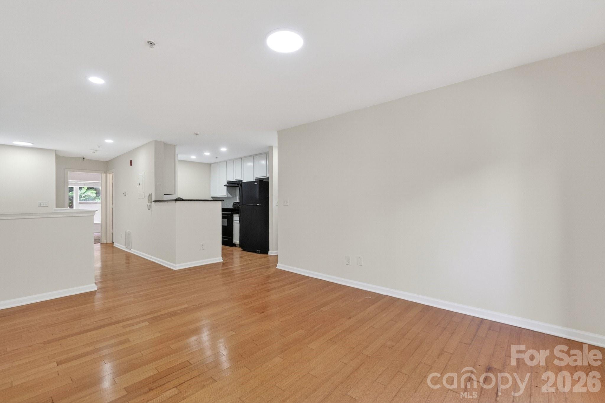 639 Raphael Place Charlotte, NC 28205 - Photo 15 of 36 a view of kitchen with wooden floor