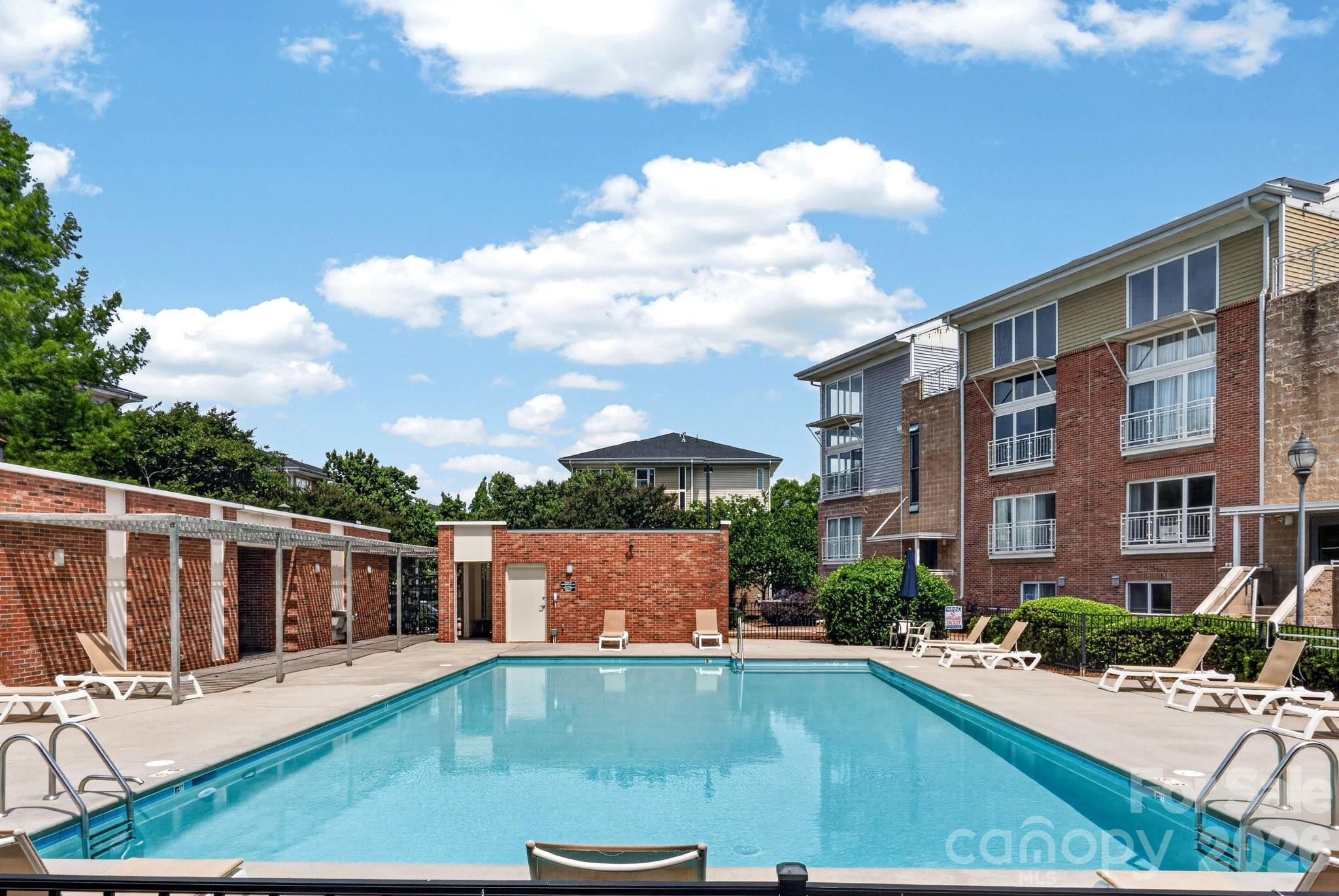 639 Raphael Place Charlotte, NC 28205 - Photo 30 of 36 a view of swimming pool with outdoor seating