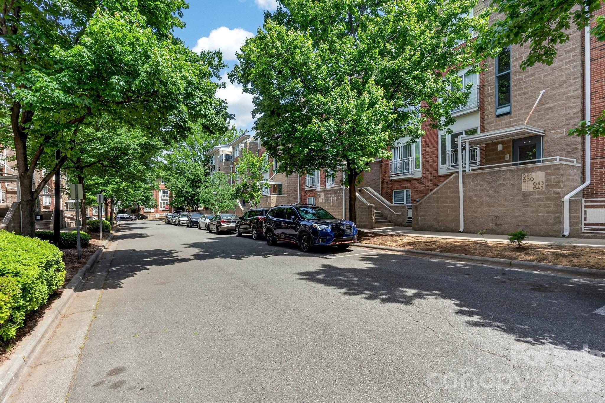639 Raphael Place Charlotte, NC 28205 - Photo 3 of 36 a view of a street with houses on both side