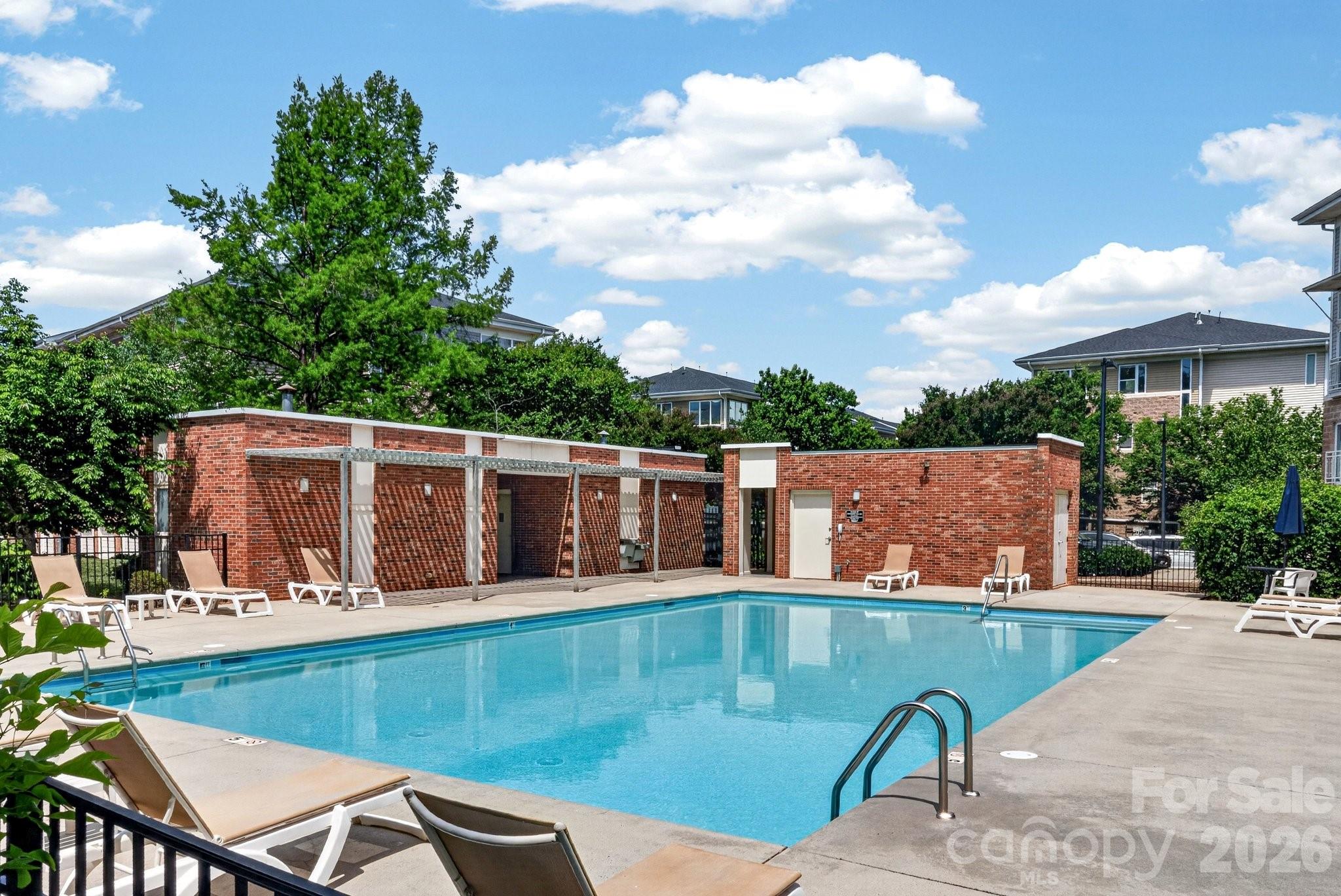 639 Raphael Place Charlotte, NC 28205 - Photo 31 of 36 a view of a swimming pool with a patio