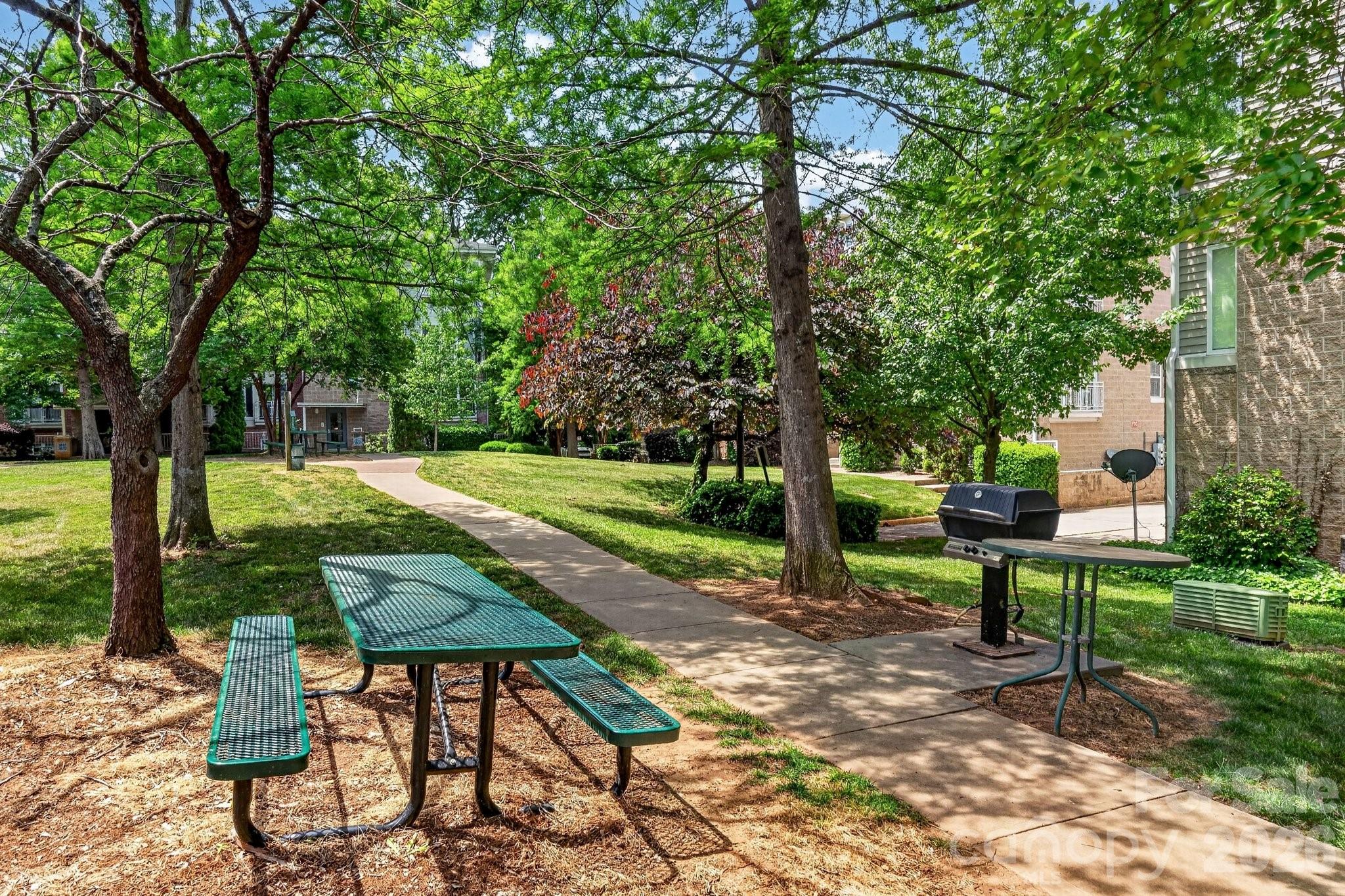 639 Raphael Place Charlotte, NC 28205 - Photo 32 of 36 a view of a chair and table in the garden