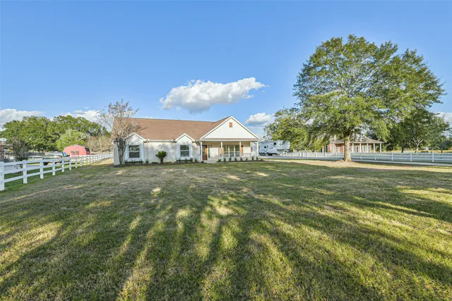 a house view with a garden space