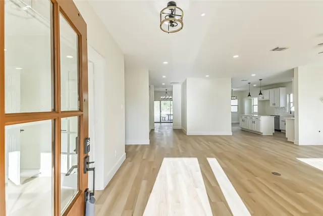 a view of a living room with a large window