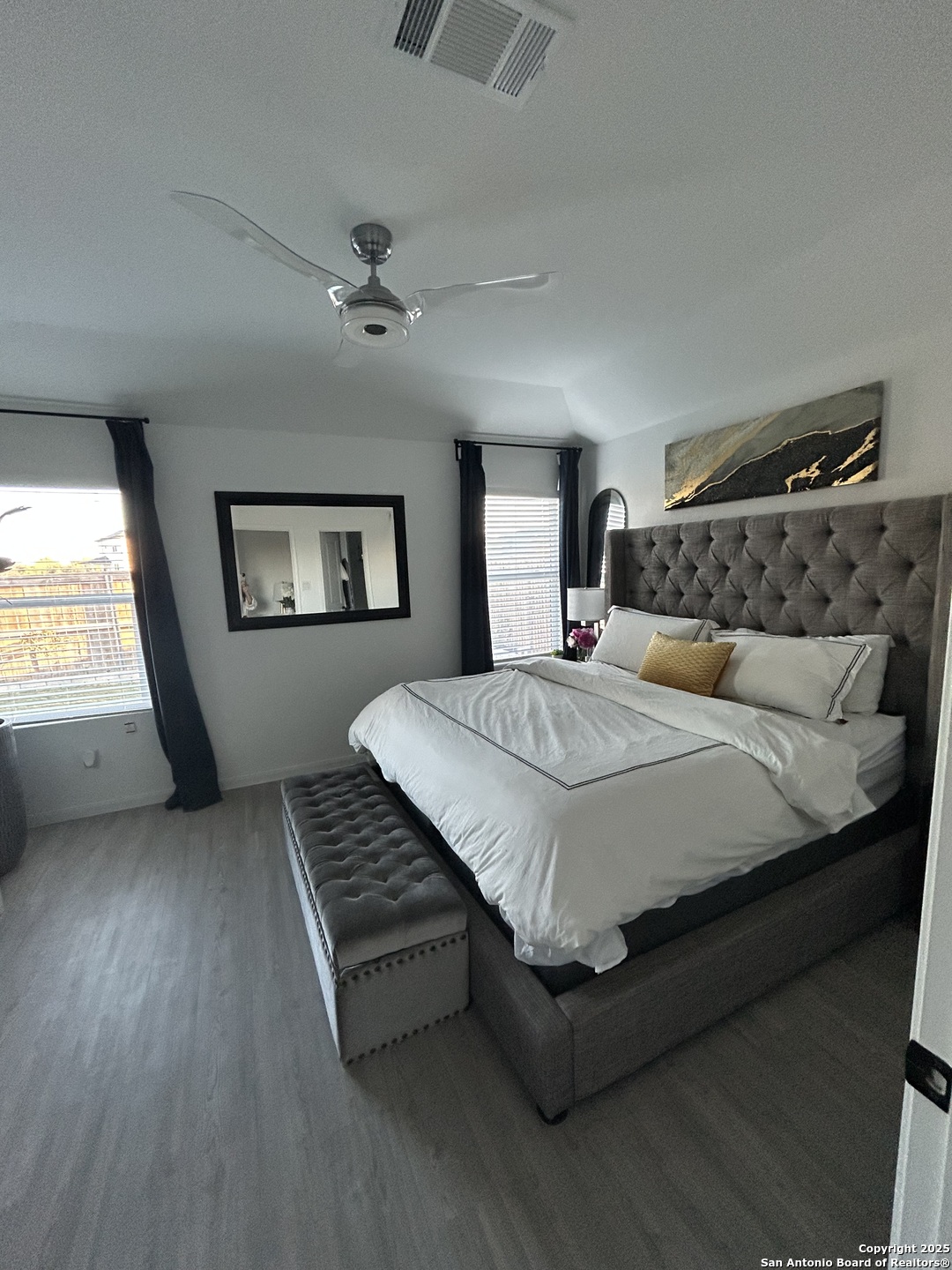 10127 Helios Heights Converse, TX 78109 - Photo 9 of 16 a bedroom with a bed and a window