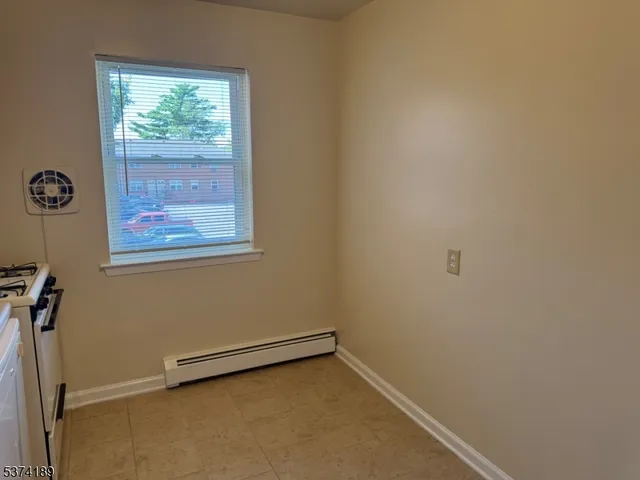 a view of a room with a window