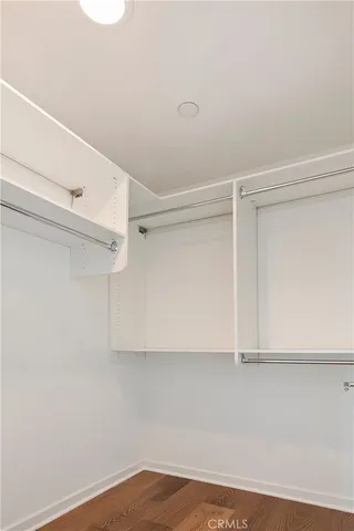 a view of an empty walk in closet