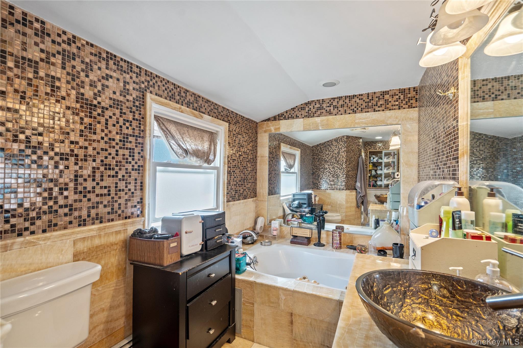 9 Rugby Road Massapequa, NY 11758 - Photo 19 of 33 a living room with furniture a large window and a dining table