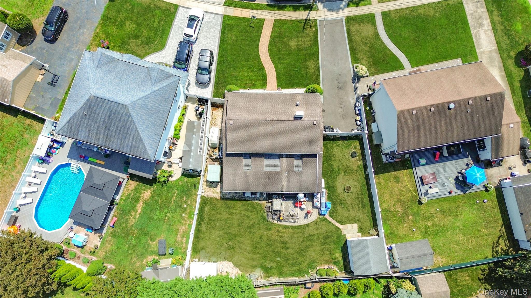9 Rugby Road Massapequa, NY 11758 - Photo 29 of 33 an aerial view of a house having swimming pool garden and patio