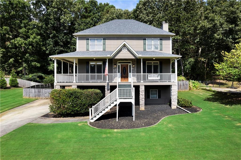408 Eagle Ridge Trail Canton, GA 30114 - Photo 1 of 1 a front view of a house with a yard