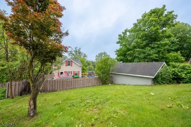 a house view with a garden space