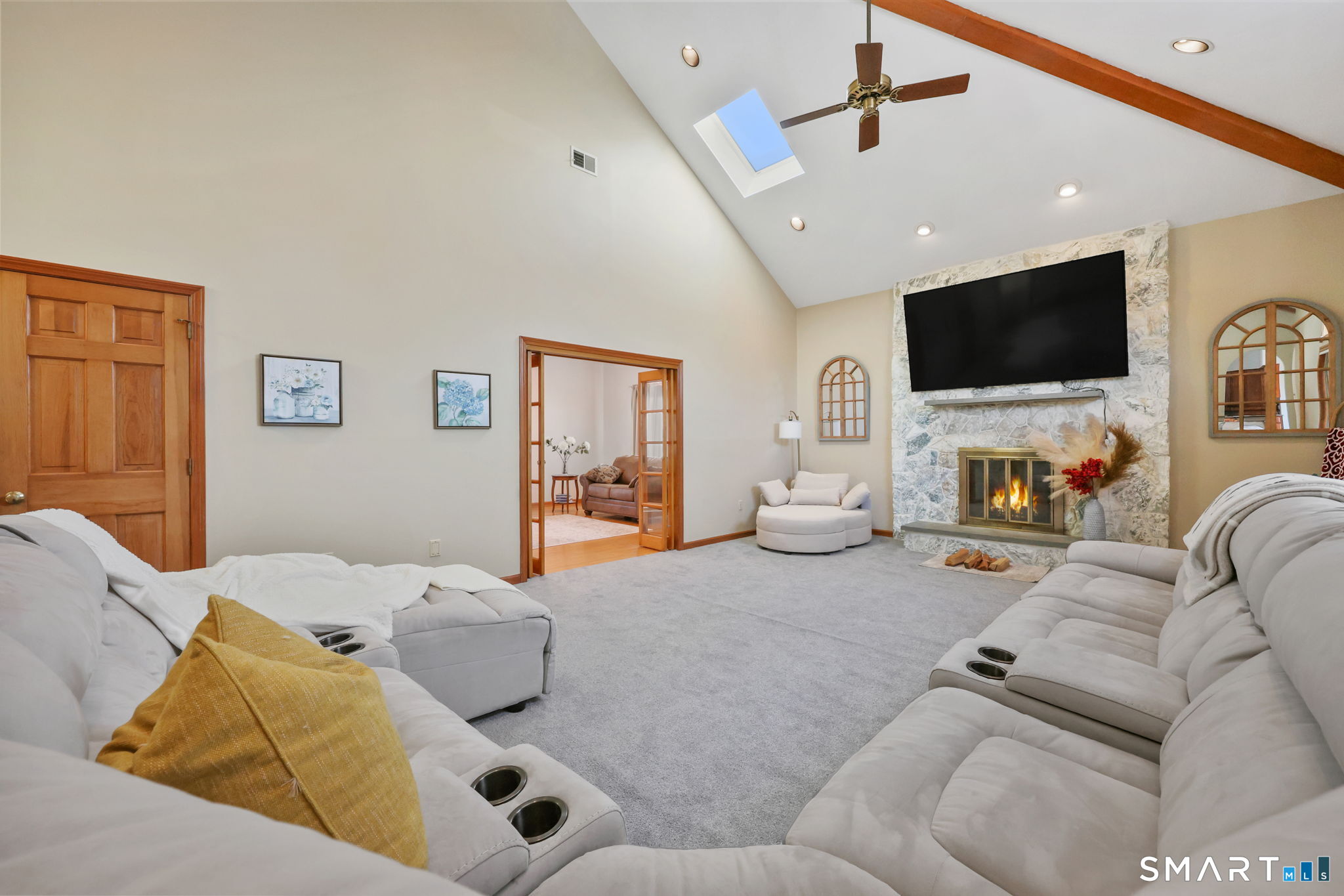 41 Ridge Line Road Easton, CT 06612 - Photo 22 of 40 a living room with furniture and a flat screen tv