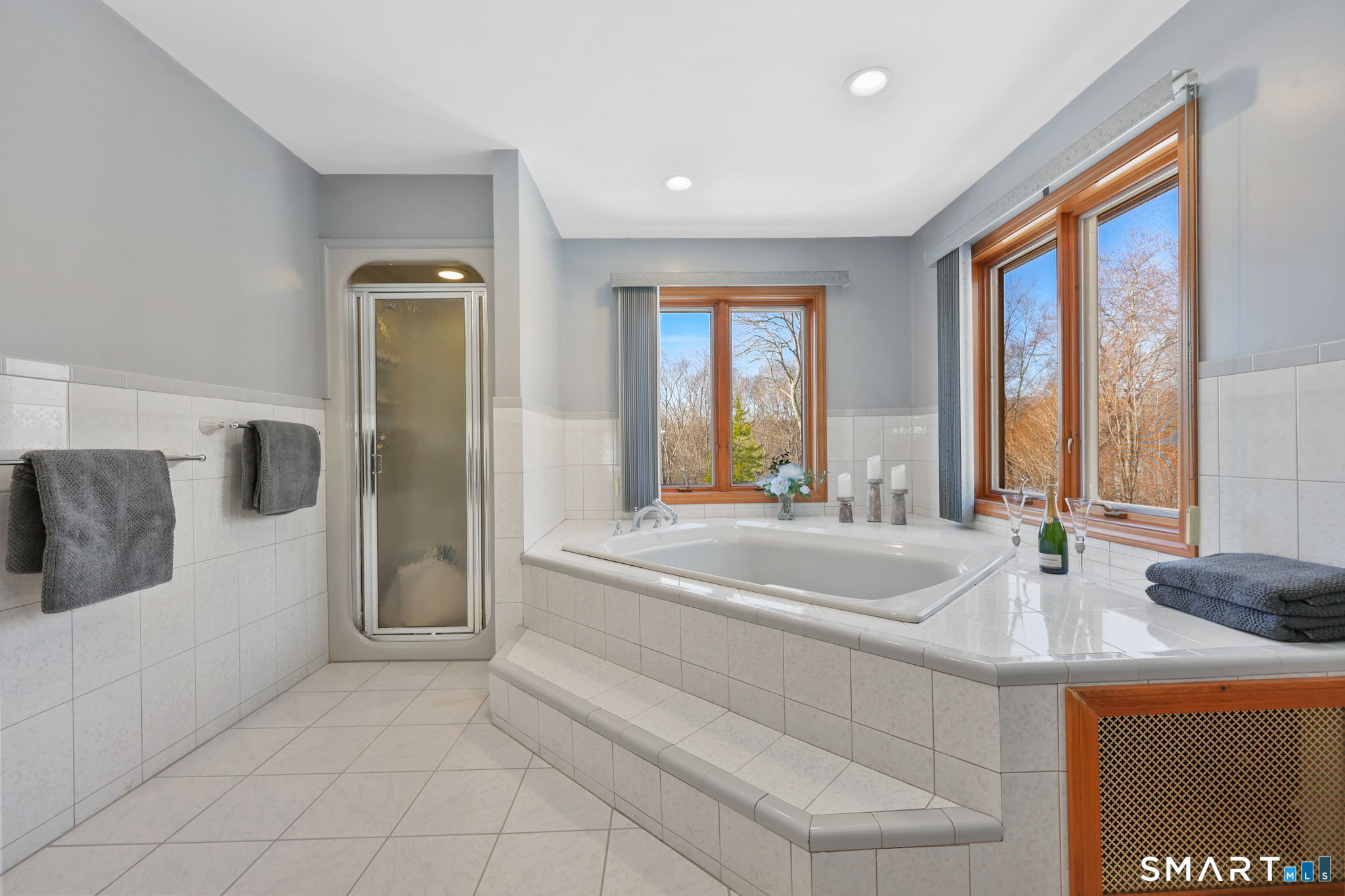 41 Ridge Line Road Easton, CT 06612 - Photo 30 of 40 a spacious bathroom with a tub sink and mirror
