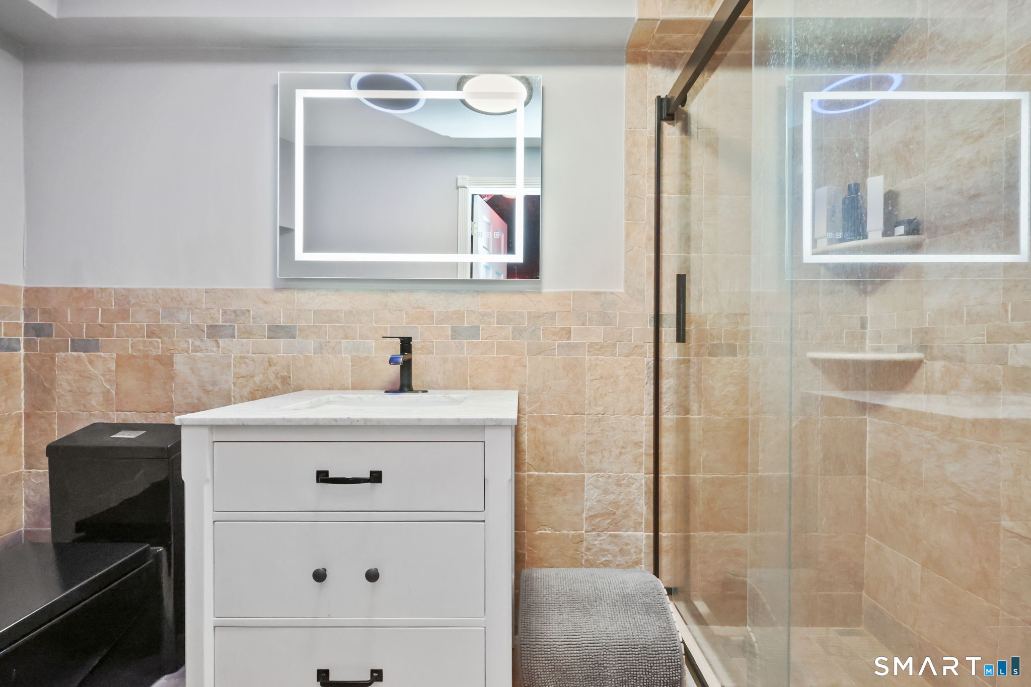 41 Ridge Line Road Easton, CT 06612 - Photo 32 of 40 a bathroom with a sink vanity and a mirror