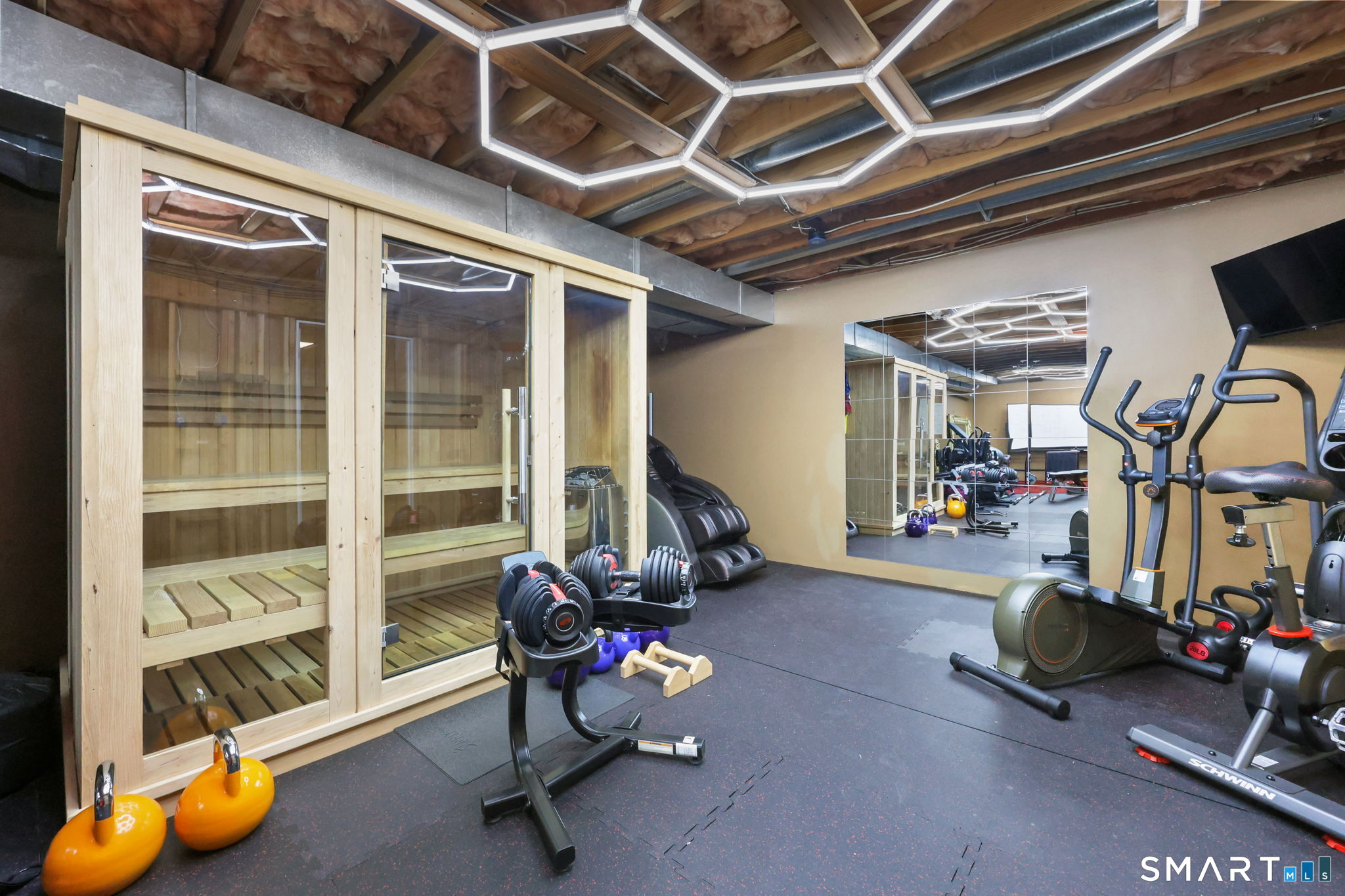 41 Ridge Line Road Easton, CT 06612 - Photo 36 of 40 a view of a room with gym equipment