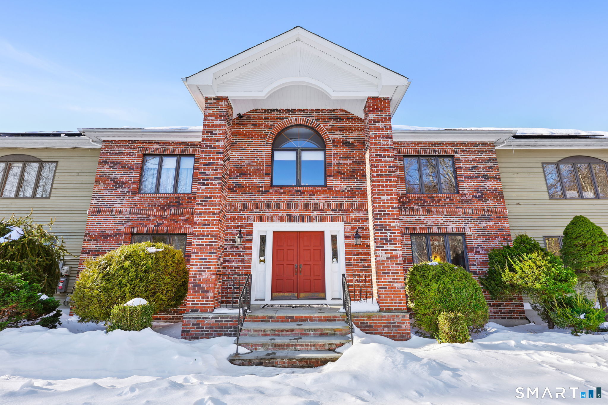 41 Ridge Line Road Easton, CT 06612 - Photo 5 of 40 front view of a brick house with a small yard