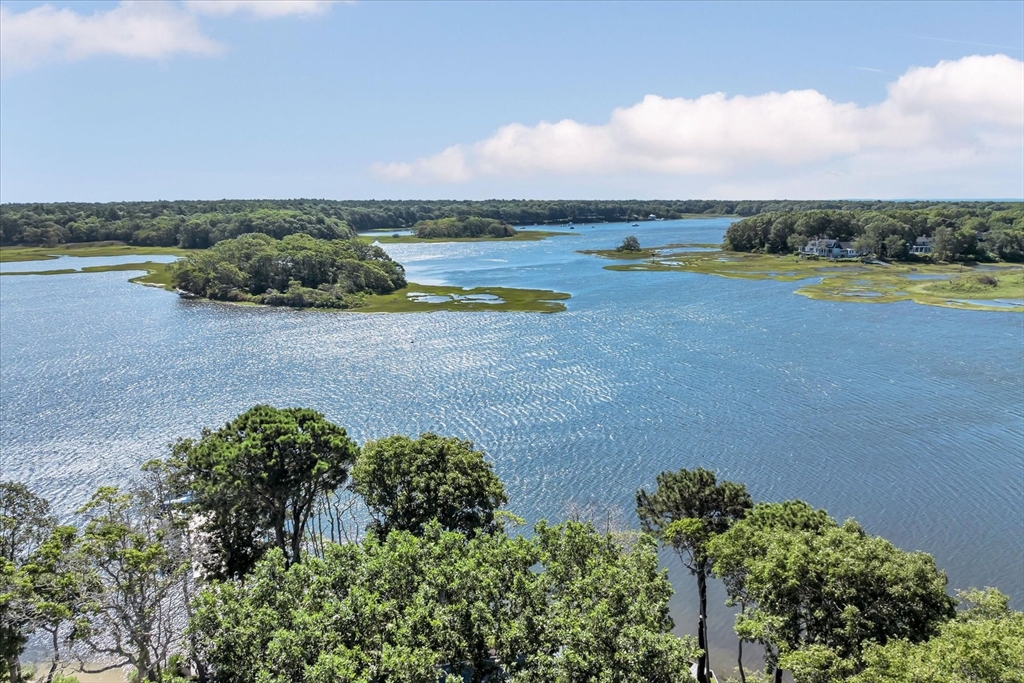 9 Point Road Mashpee, MA 02649 - Photo 2 of 27 an aerial view of a houses with ocean view