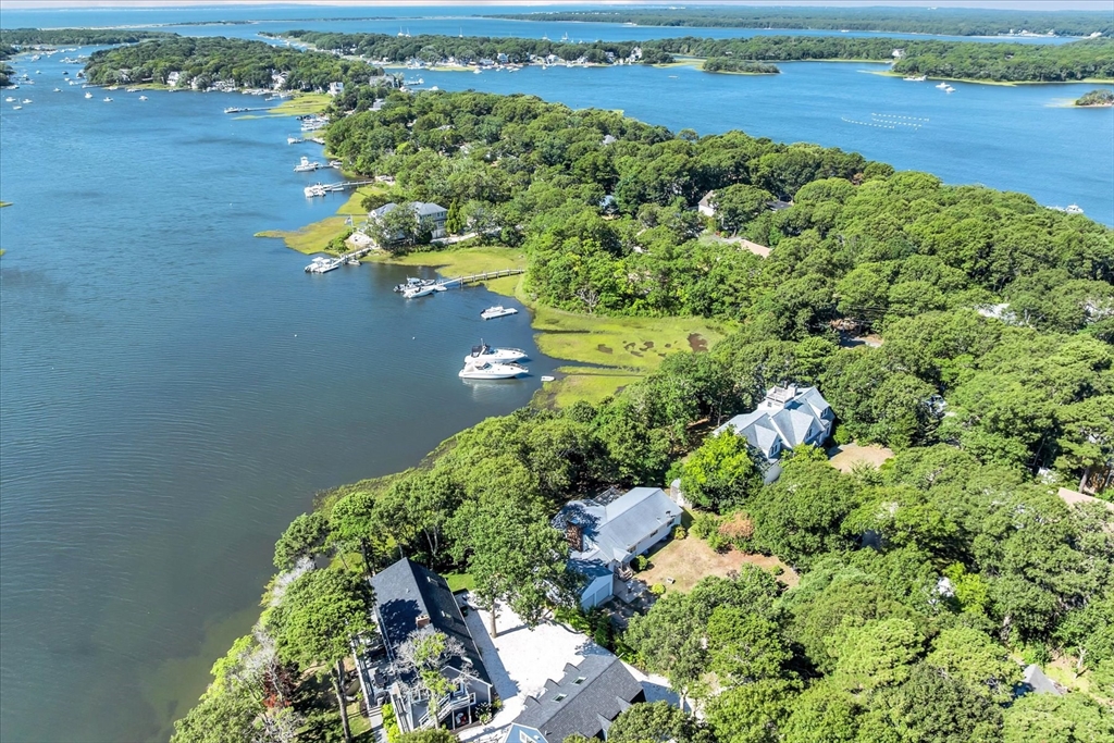 9 Point Road Mashpee, MA 02649 - Photo 5 of 27 an aerial view of a houses with a yard