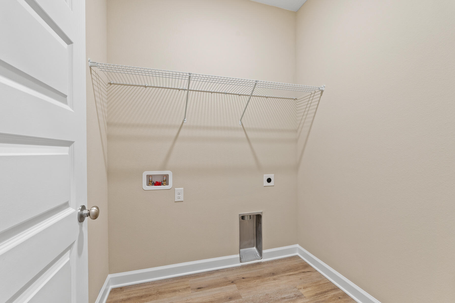 6011 Sand Hill Road Crestview, FL 32539 - Photo 16 of 16 a view of a room with racks on the wall