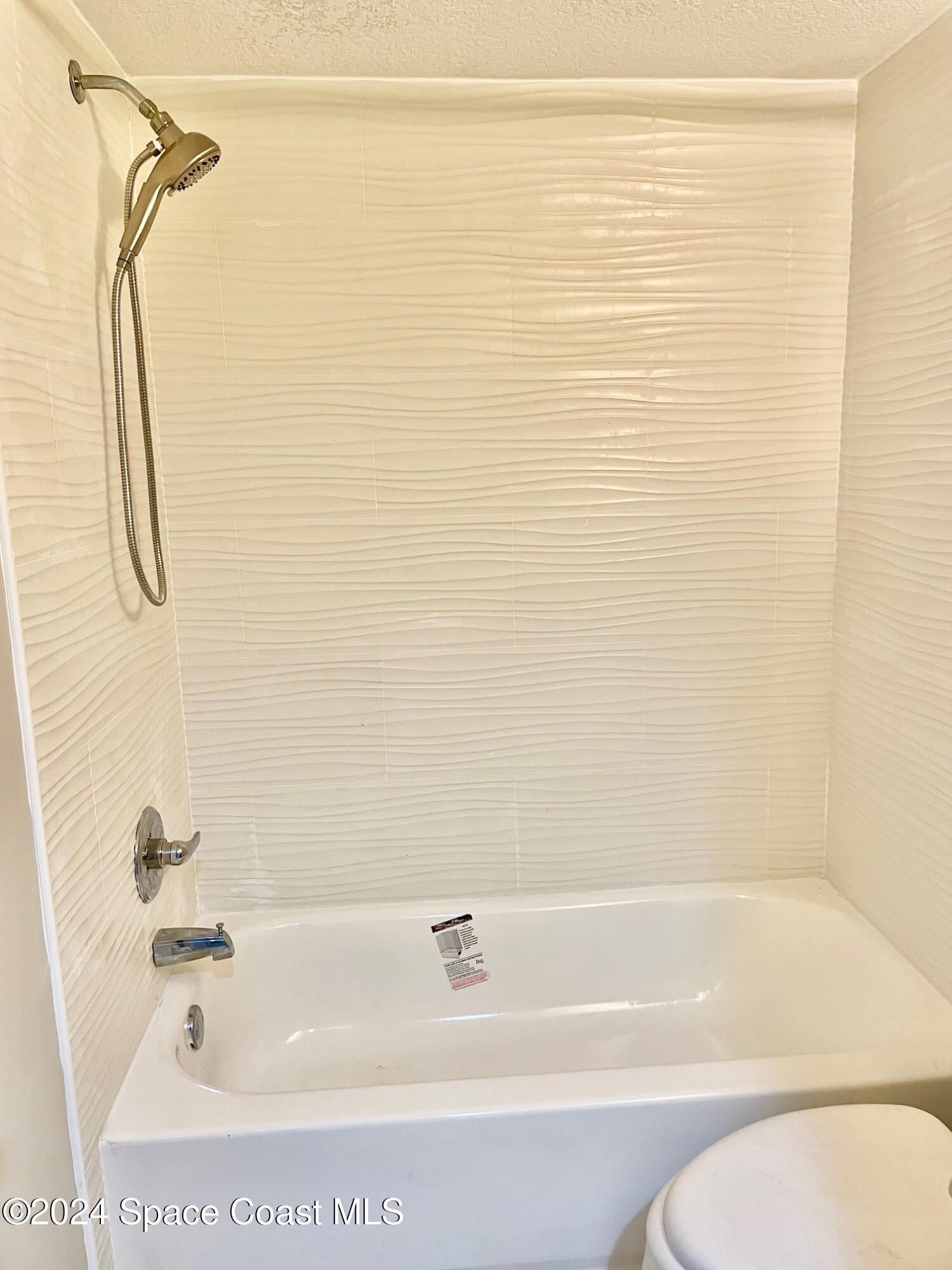 1225 North Wickham Road, Unit 415 Melbourne, FL 32935 - Photo 15 of 34 2nd Bathroom ALL NEW Shower