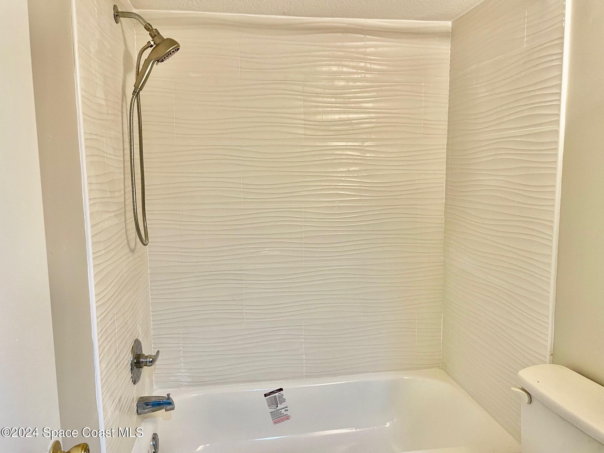 1225 North Wickham Road, Unit 415 Melbourne, FL 32935 - Photo 16 of 34 2nd Bathroom ALL NEW Shower