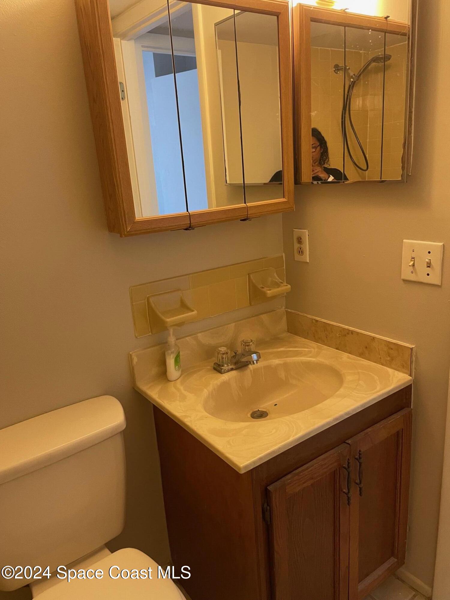 1225 North Wickham Road, Unit 415 Melbourne, FL 32935 - Photo 17 of 34 2nd Bathroom Sink Area