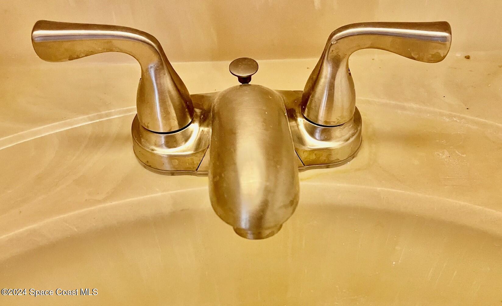 1225 North Wickham Road, Unit 415 Melbourne, FL 32935 - Photo 18 of 34 NEW FAUCET INSTALLED IN 2ND BATHROOM
