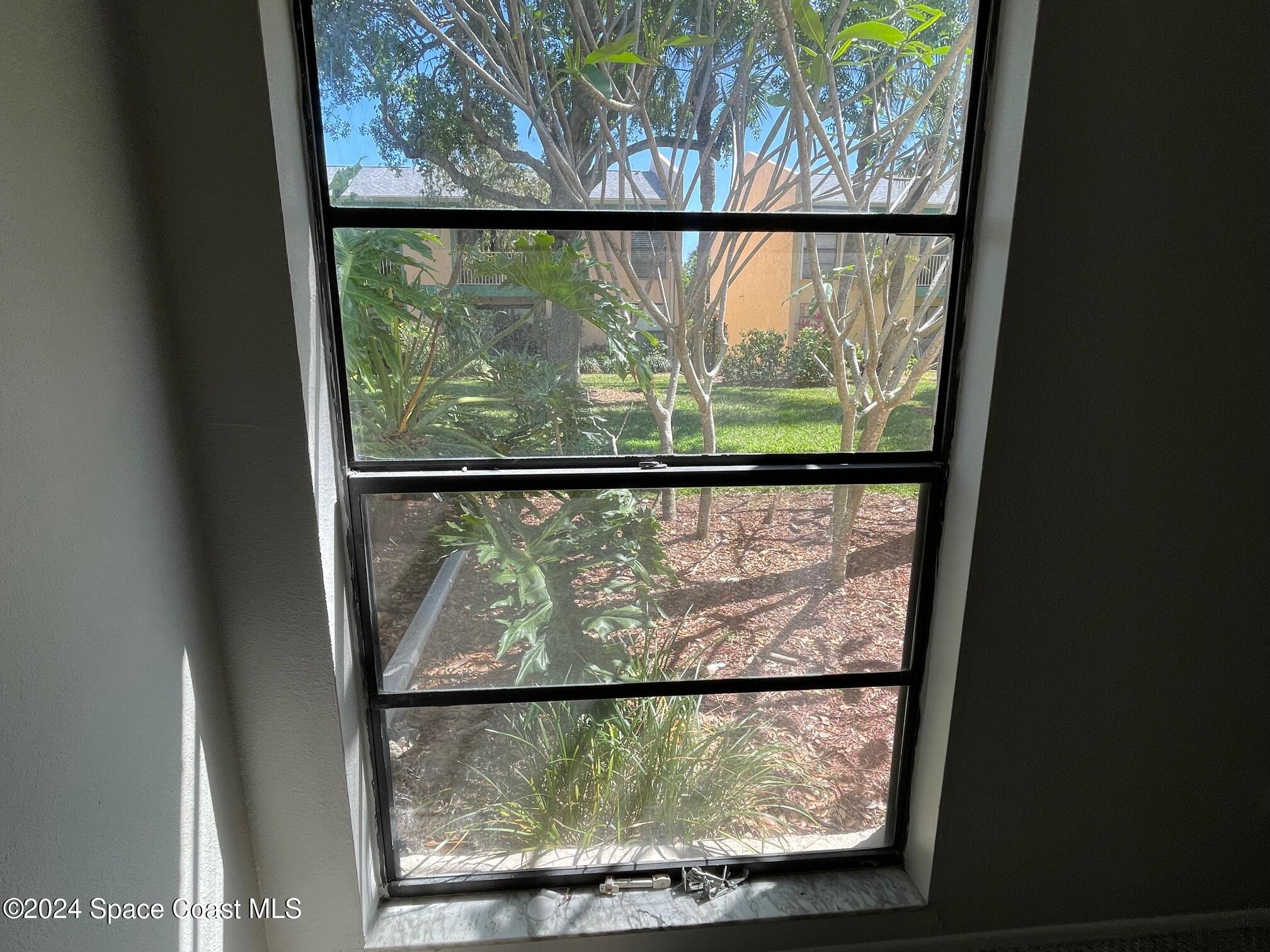 1225 North Wickham Road, Unit 415 Melbourne, FL 32935 - Photo 20 of 34 Master Bedroom Window