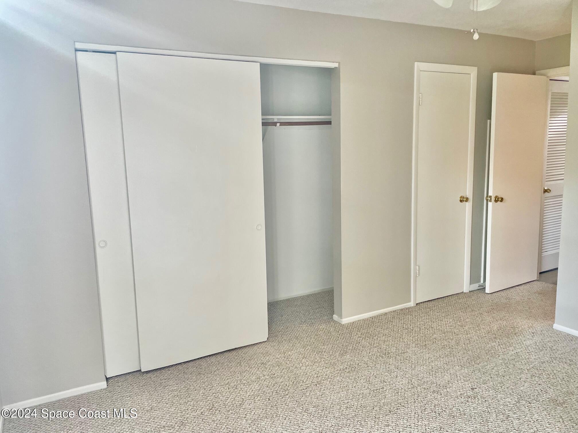 1225 North Wickham Road, Unit 415 Melbourne, FL 32935 - Photo 22 of 34 Master Bedroom