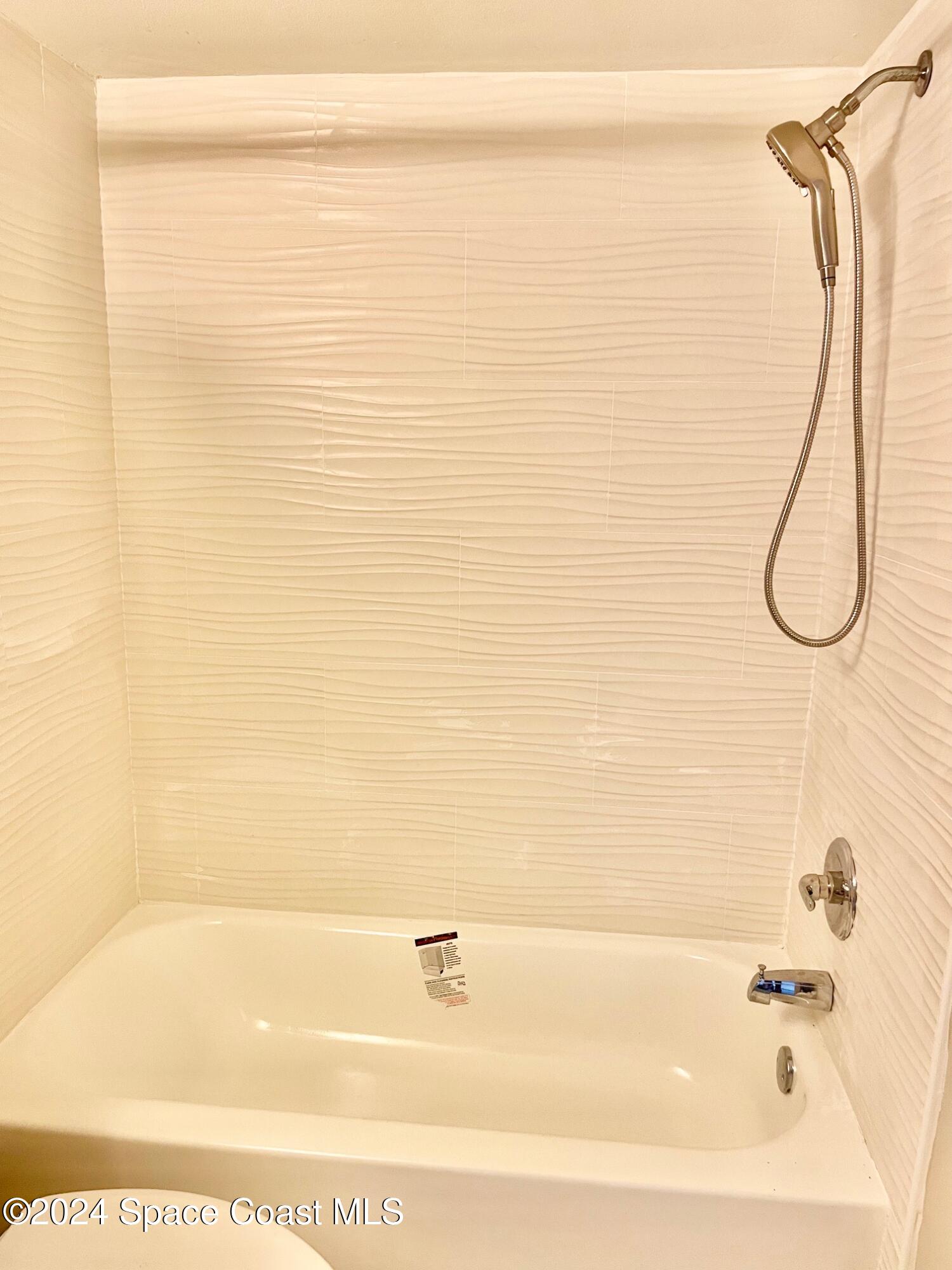 1225 North Wickham Road, Unit 415 Melbourne, FL 32935 - Photo 23 of 34 Master Bathroom ALL NEW Shower