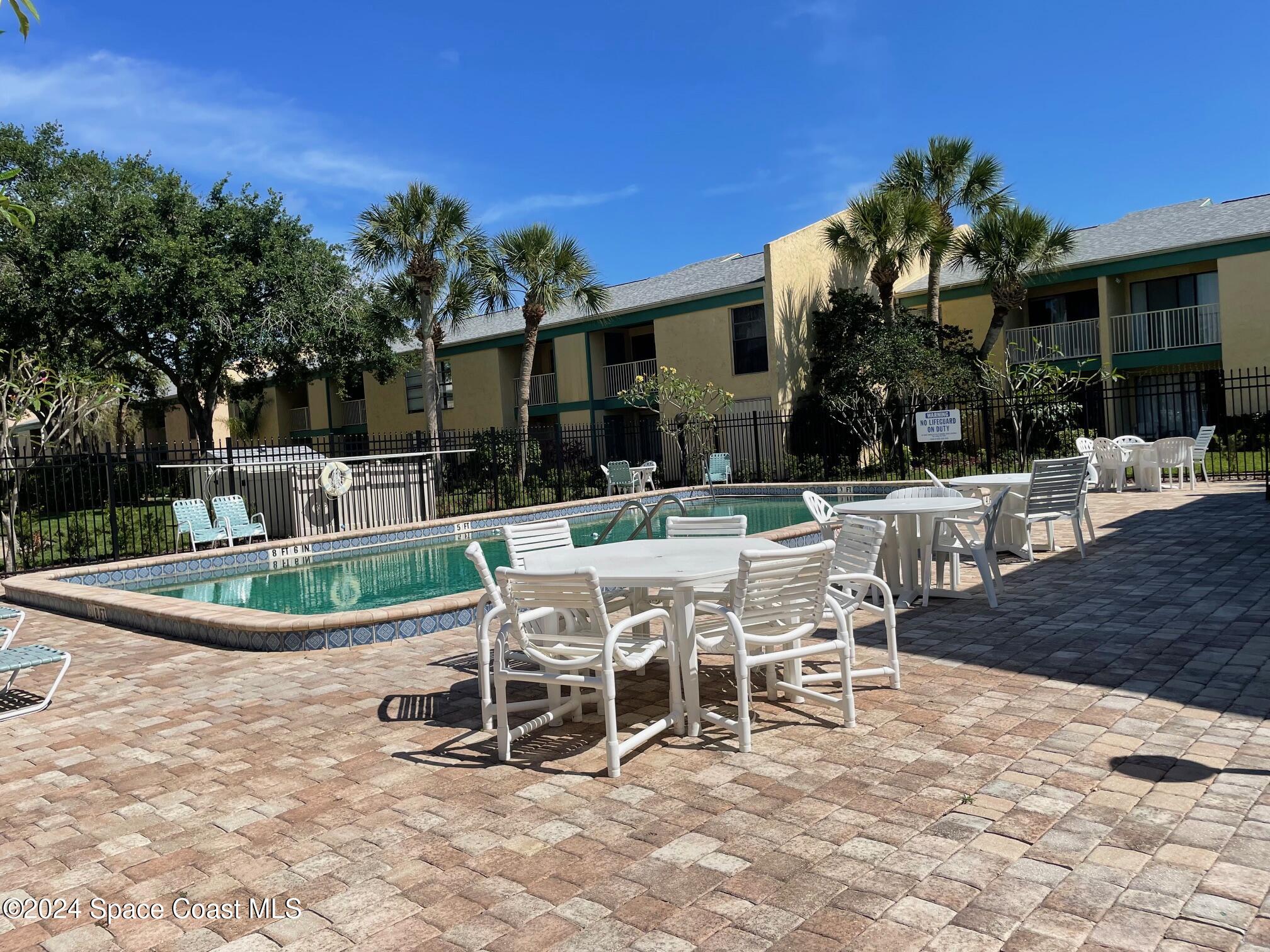 1225 North Wickham Road, Unit 415 Melbourne, FL 32935 - Photo 28 of 34 Community Pool Area