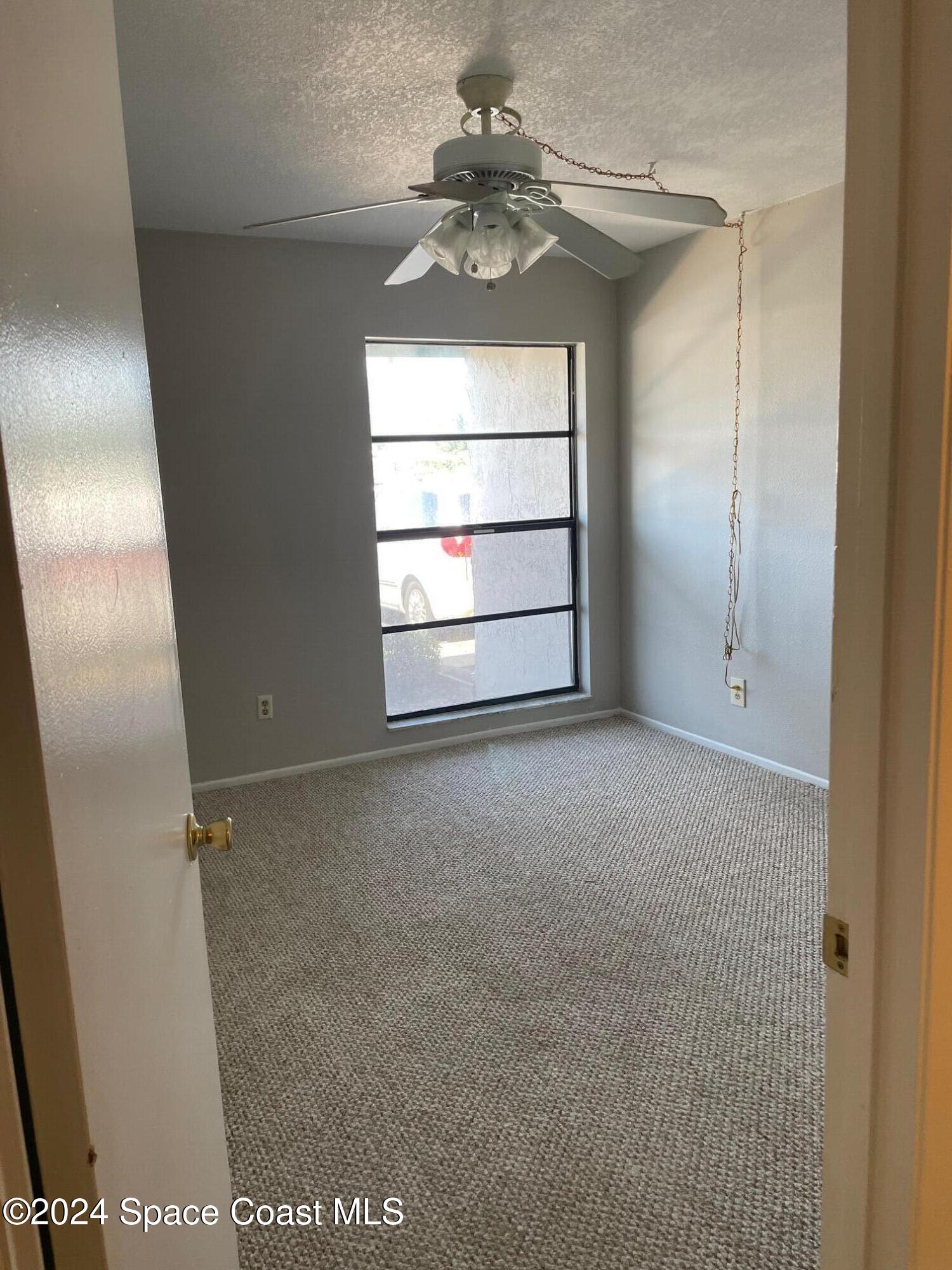 1225 North Wickham Road, Unit 415 Melbourne, FL 32935 - Photo 9 of 34 2nd Bedroom