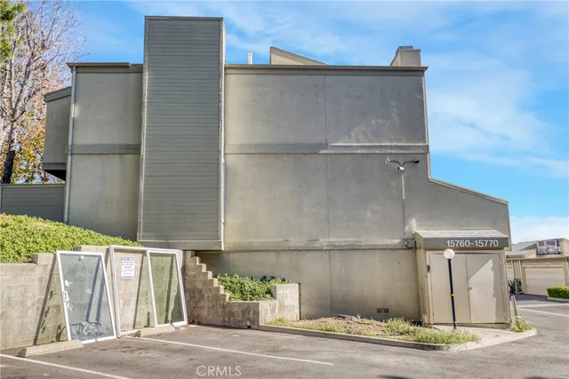 an aerial view of a house with a garden