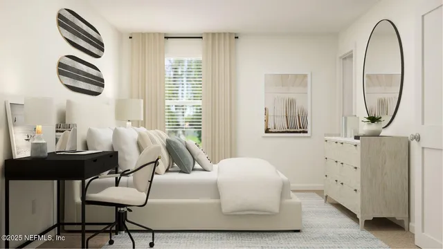 a bedroom with a bed and a chair