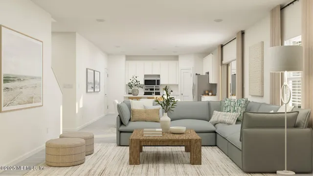 a kitchen with stainless steel appliances a white table chairs and a refrigerator