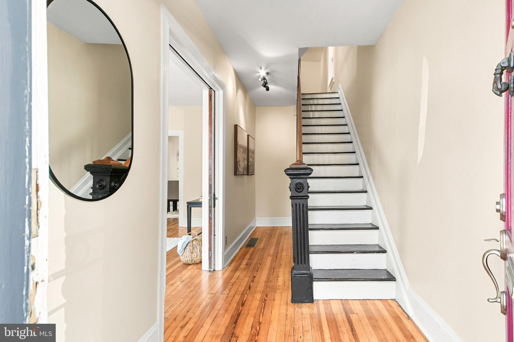 23 West 4th Street Frederick, MD 21701 - Photo 26 of 105 a view of a hallway with wooden floor and entryway