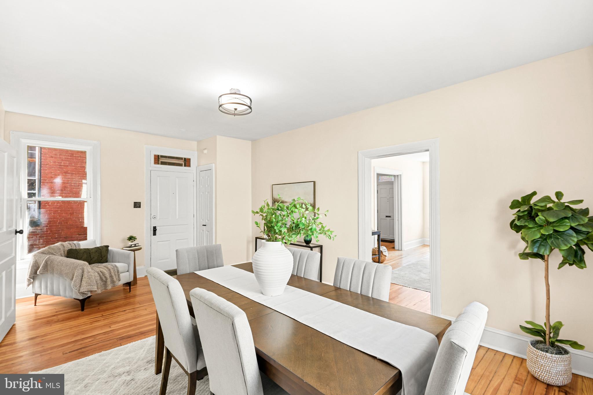 23 West 4th Street Frederick, MD 21701 - Photo 34 of 105 a view of a dining room with furniture and wooden floor