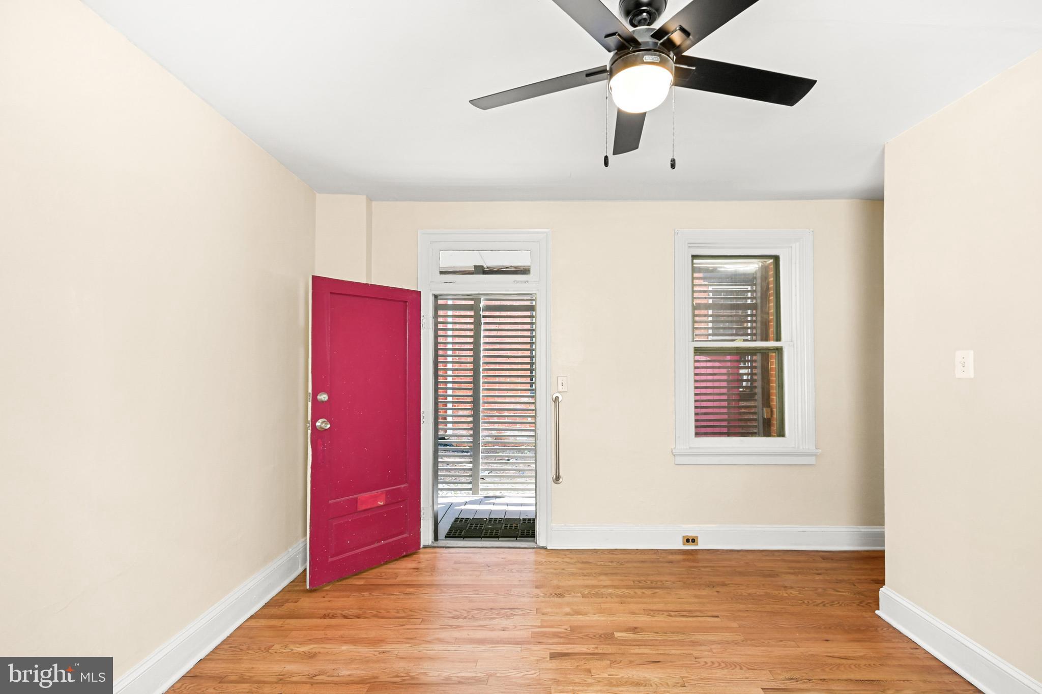 23 West 4th Street Frederick, MD 21701 - Photo 38 of 105 a view of an empty room with window and a ceiling fan