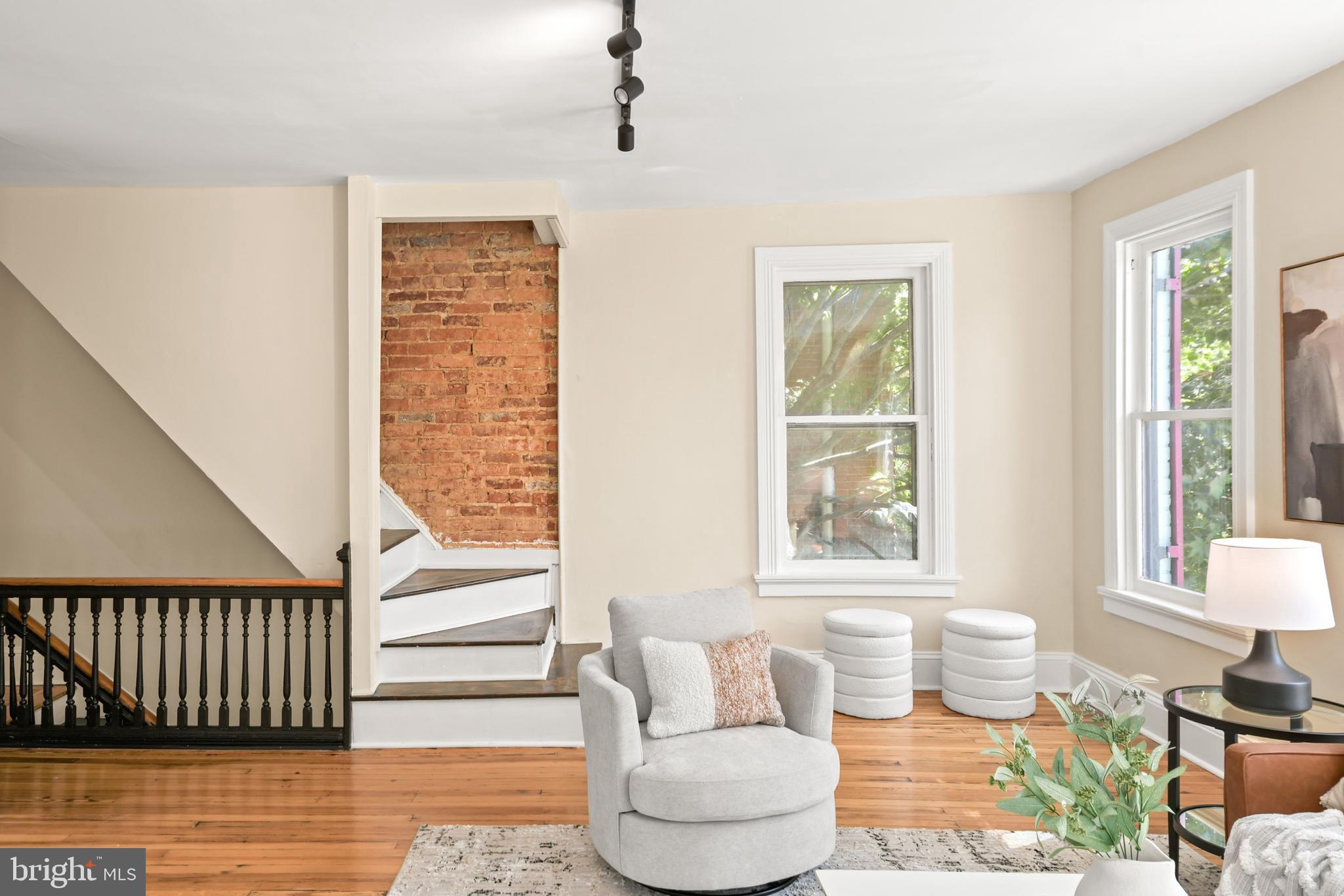 23 West 4th Street Frederick, MD 21701 - Photo 58 of 105 a living room with furniture and floor to ceiling windows